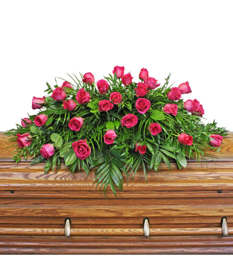 roses in casket spray