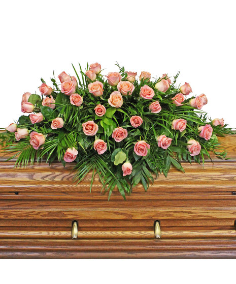 roses in casket spray
