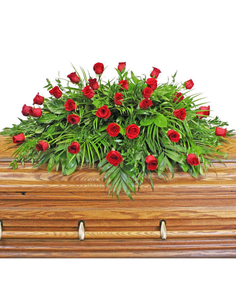 roses in casket spray