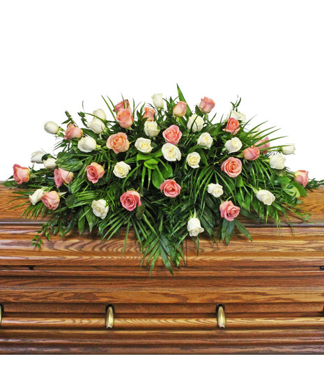 roses in casket spray