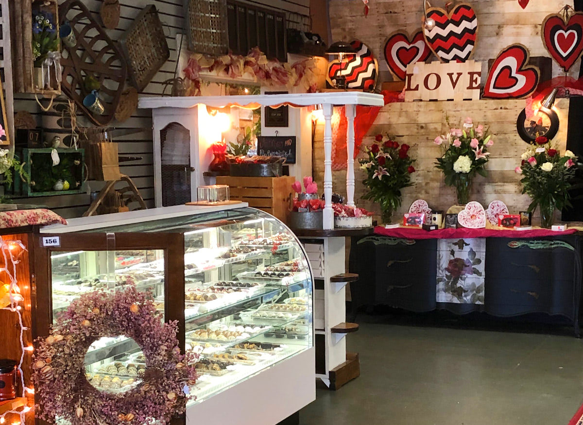 A full refrigerated display of artisan chocolates